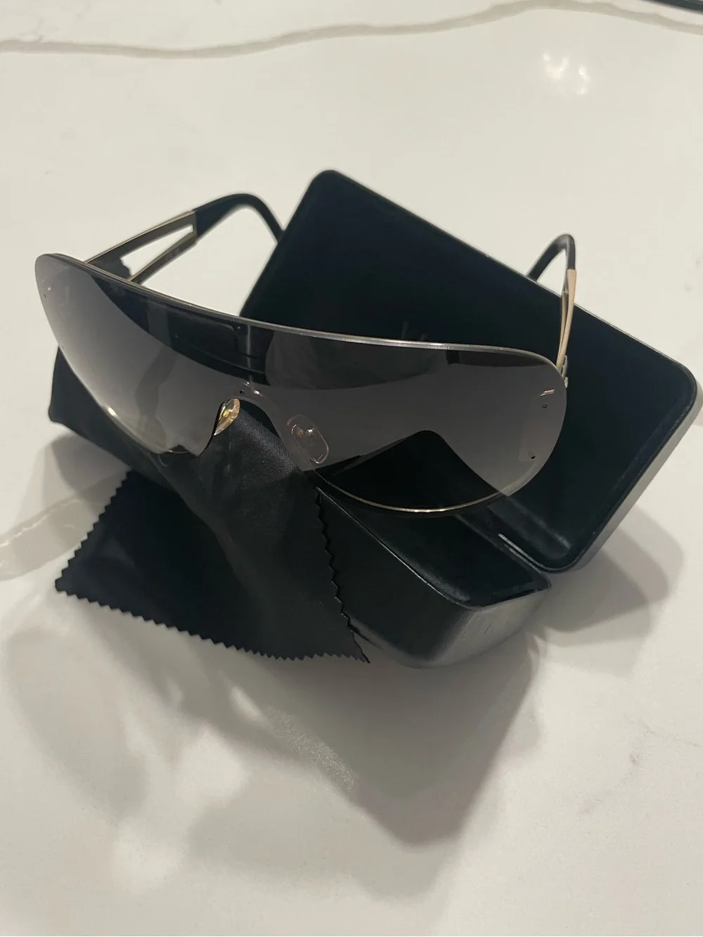 Gucci Shield Sunglasses in Black with Gold Trim